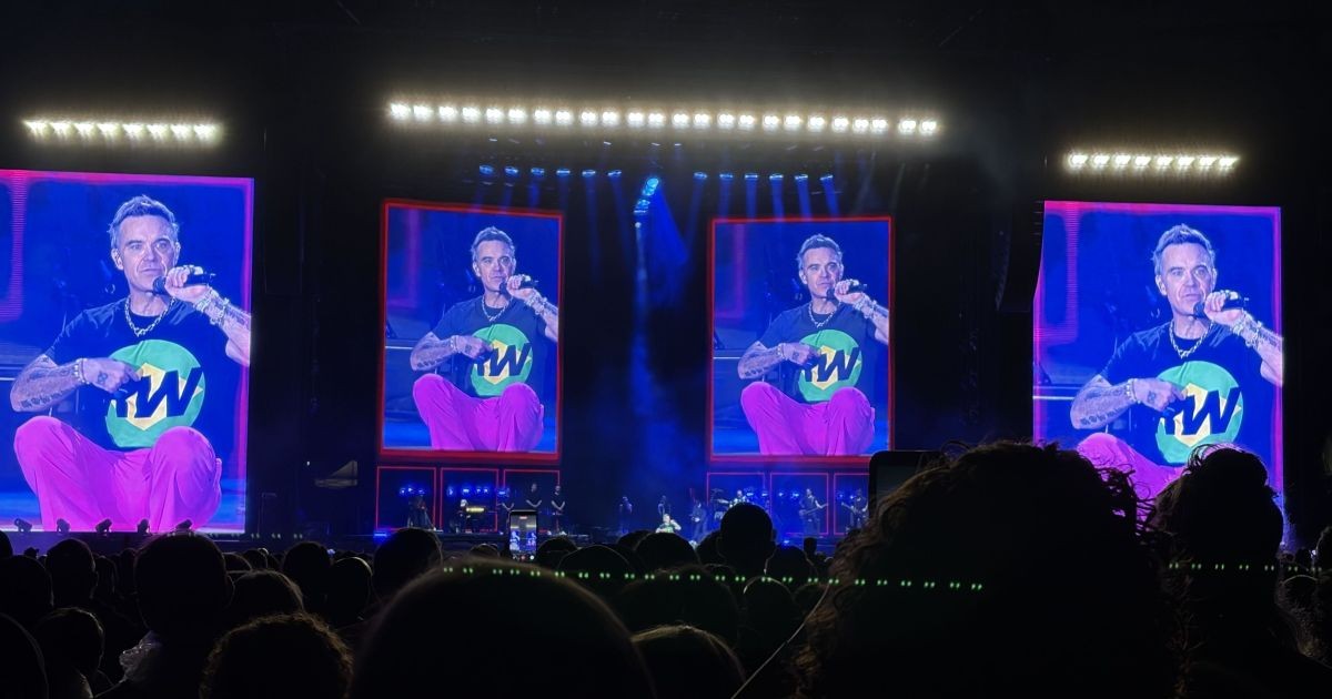Robbie Williams retorna ao Brasil depois de 20 anos e cutuca Rock in Rio