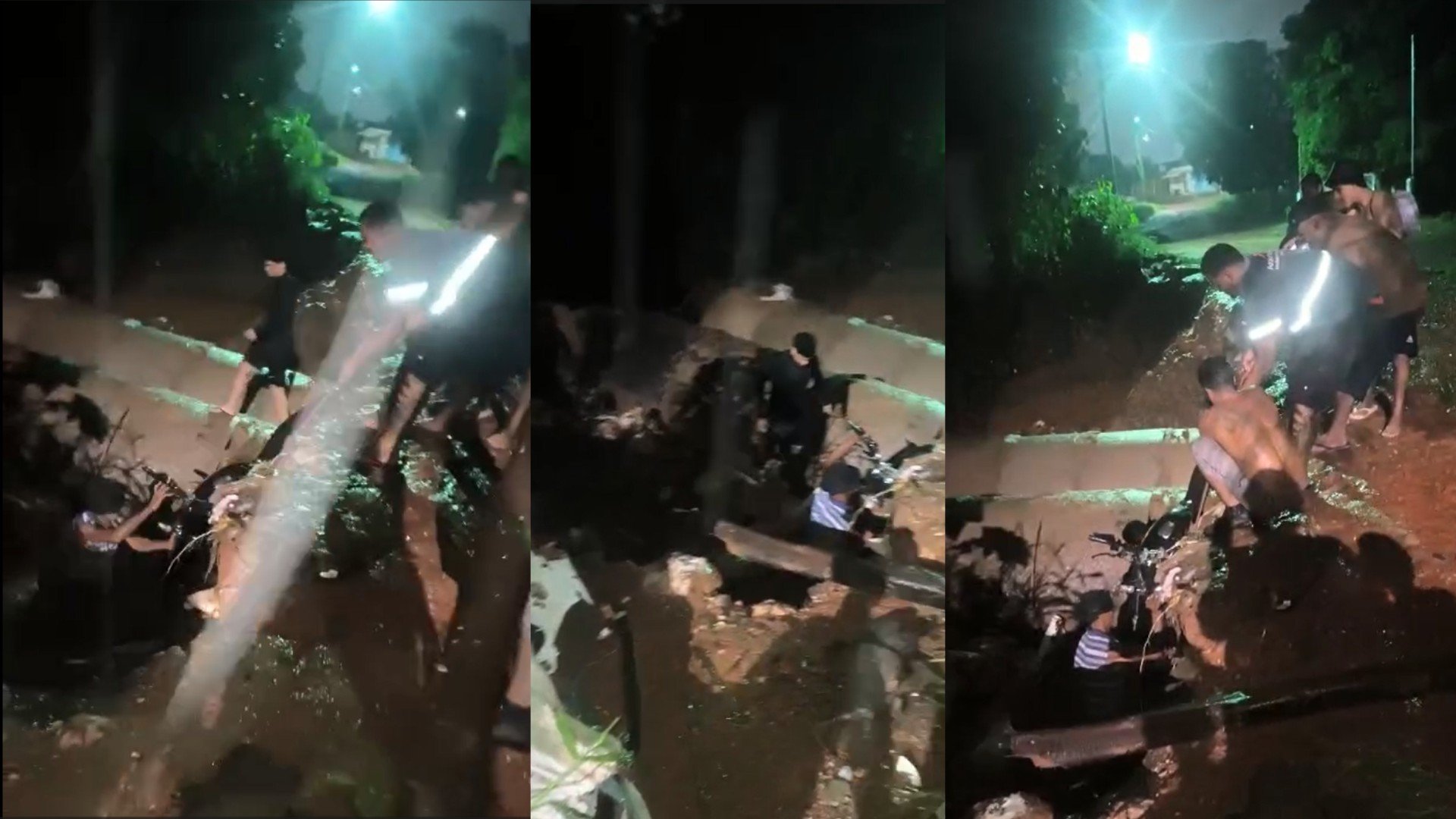 VÍDEO: 'cordão humano' resgata motociclista que caiu de ponte durante tempestade em Cuiabá
